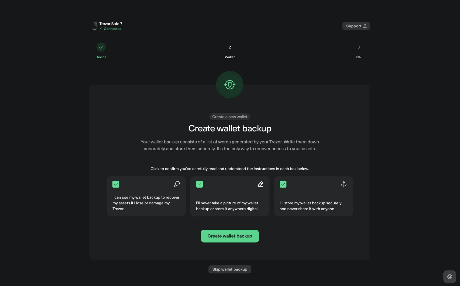 Tela Create wallet backup do Trezor Suite com as três caixas de confirmação marcadas